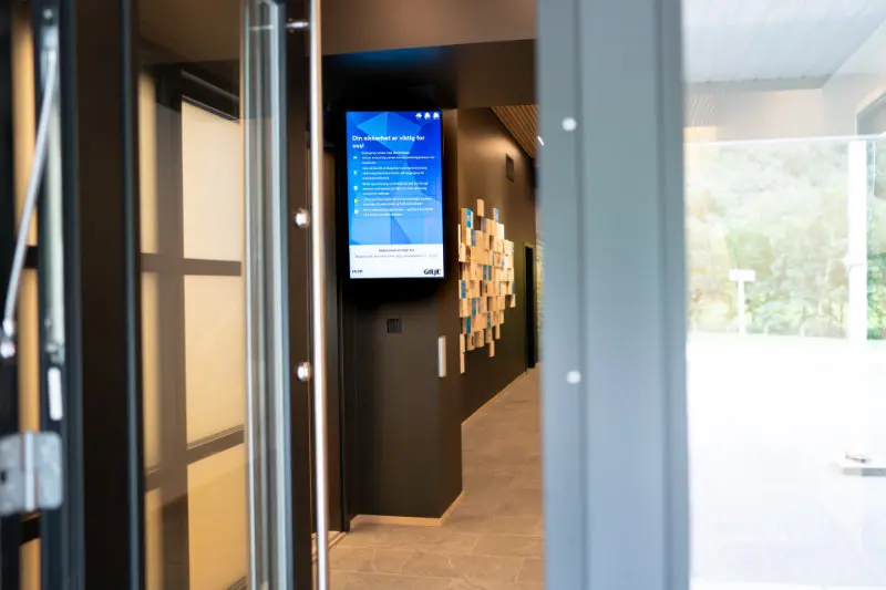 Entrance area with vertical info screen
