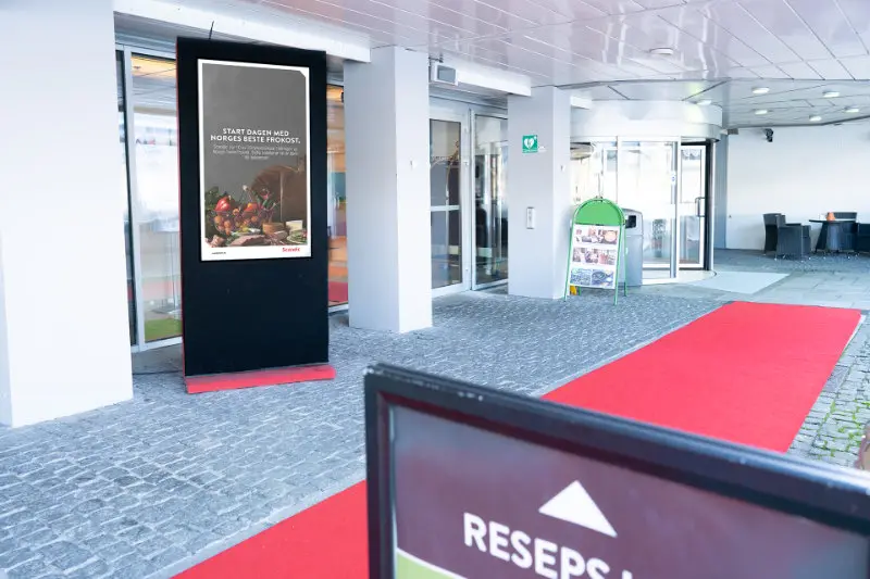 Hotel entrance with info screen